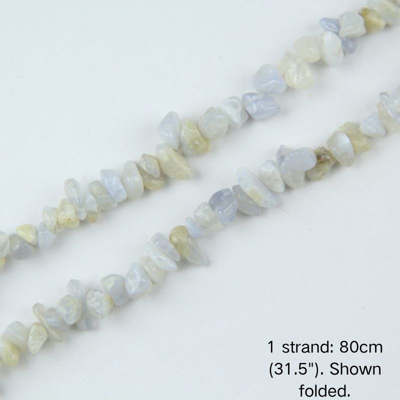 Close up of 5-8mm irregular blue chalcedony stone nuggets on nylon cord