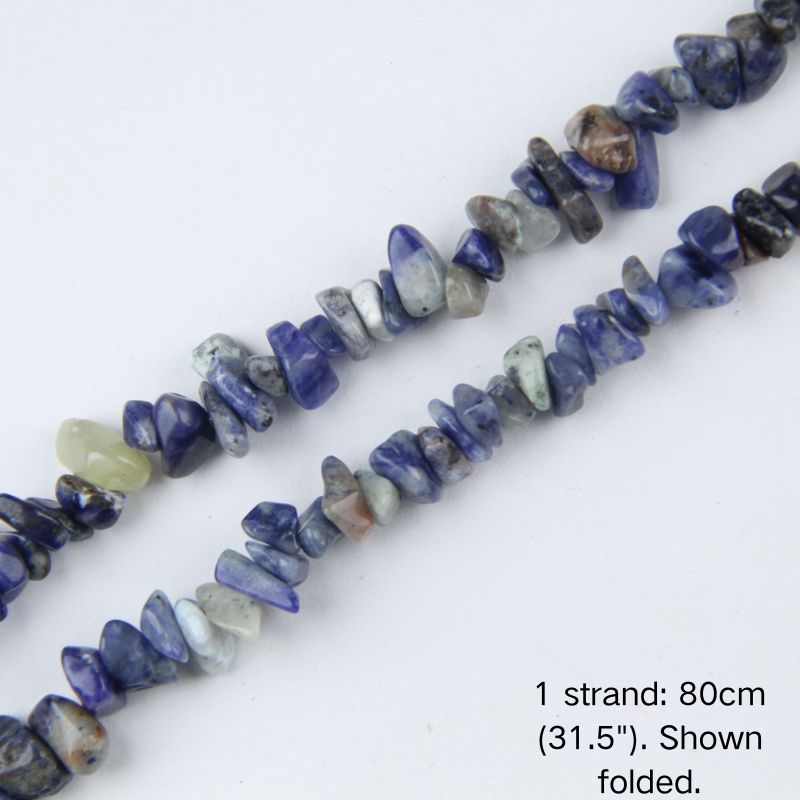 Close-up of mixed blue gemstone chip cord, 80cm folded, showing 5-8mm stones in varied blue and white earthy tones.