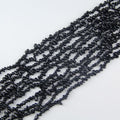 31.5 inch black obsidian irregular bead necklace laid flat on white background