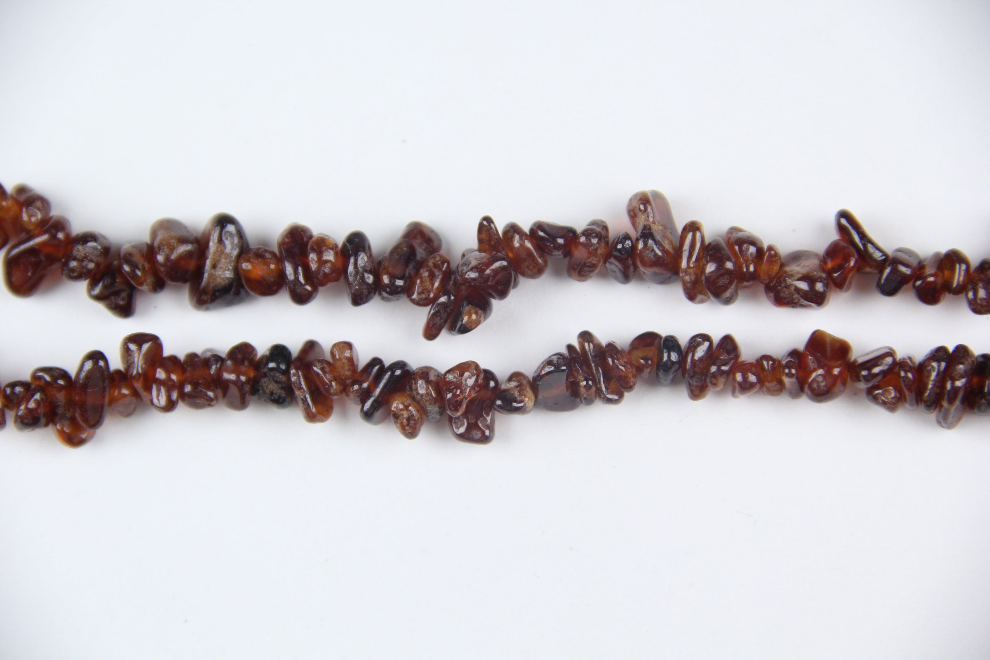 Irregular orange garnet gravel long chain