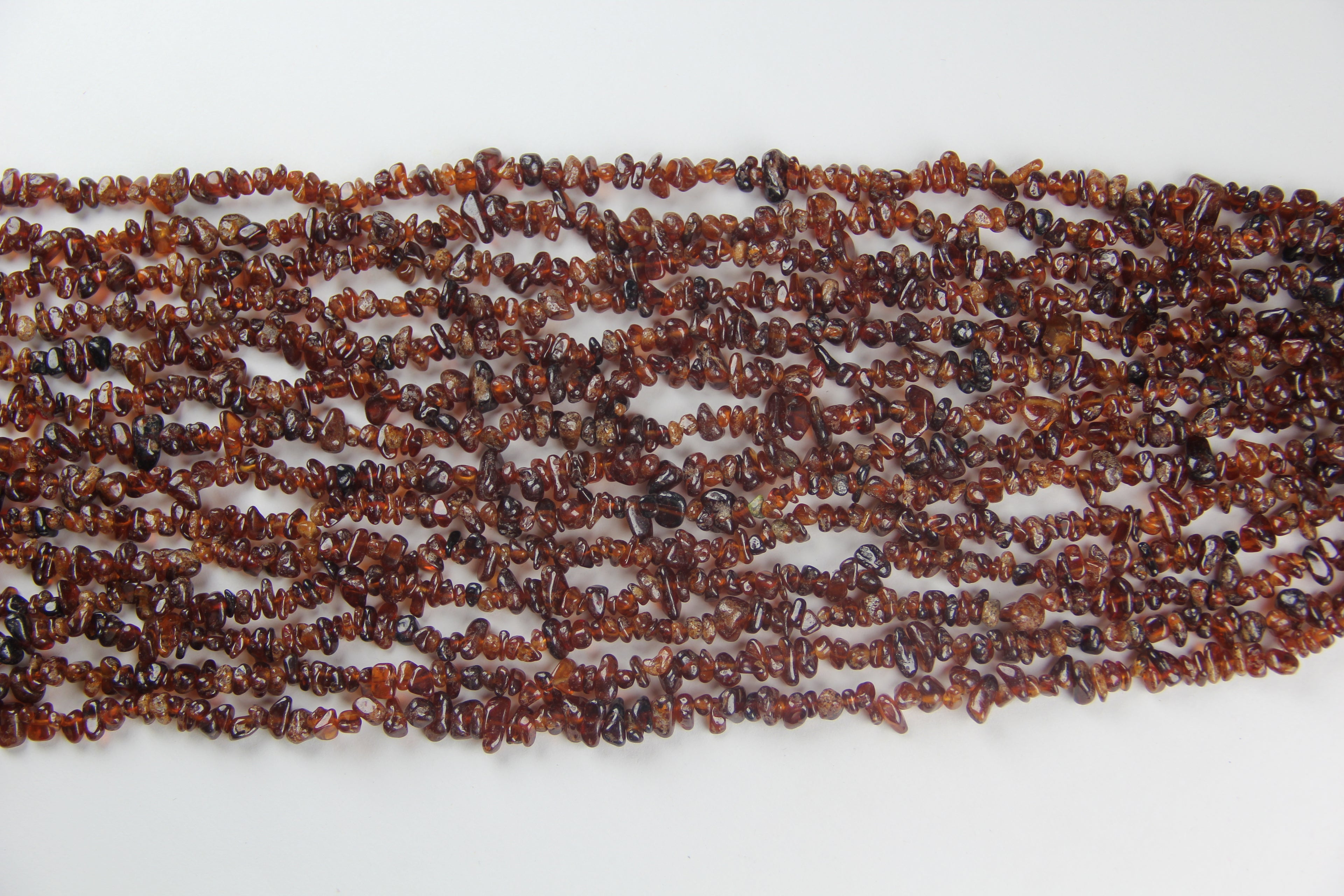Irregular orange garnet gravel long chain