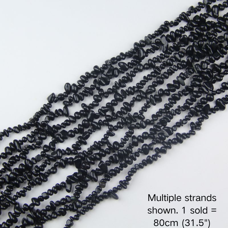 Multiple strands of natural black obsidian chip beads on nylon cord, 31.5-inch gemstone strands.