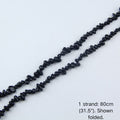 A single 80cm (31.5") strand of Black Obsidian irregular chip beads, folded to display actual length and nylon cord for jewelry crafts.