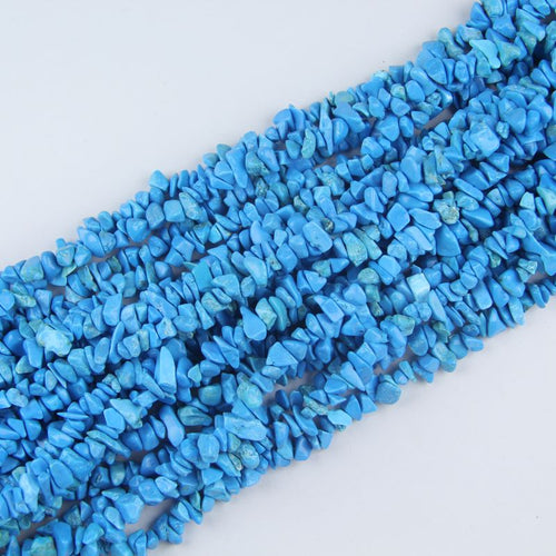 stacked coils of blue turquoise bead strand, 31.5 inches long, irregular round 5-8mm beads with natural veining on nylon cord