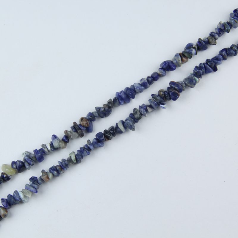 Flat lay of Blue-veins stone beads, natural blue-white banded jade gemstones