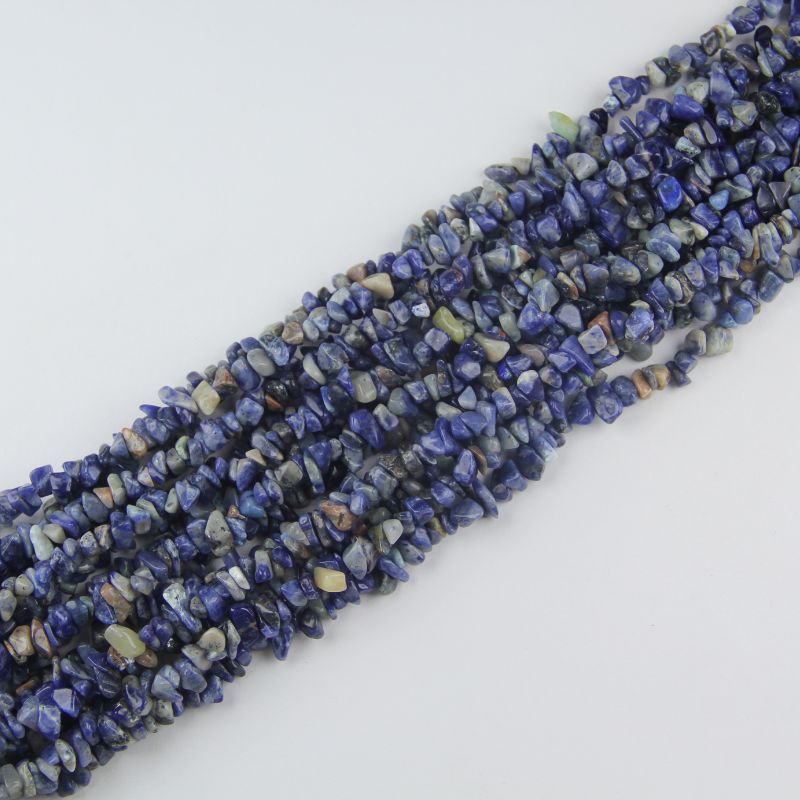 Blue-veins stone bracelet stacked in coils, natural sodalite jade beads flat lay