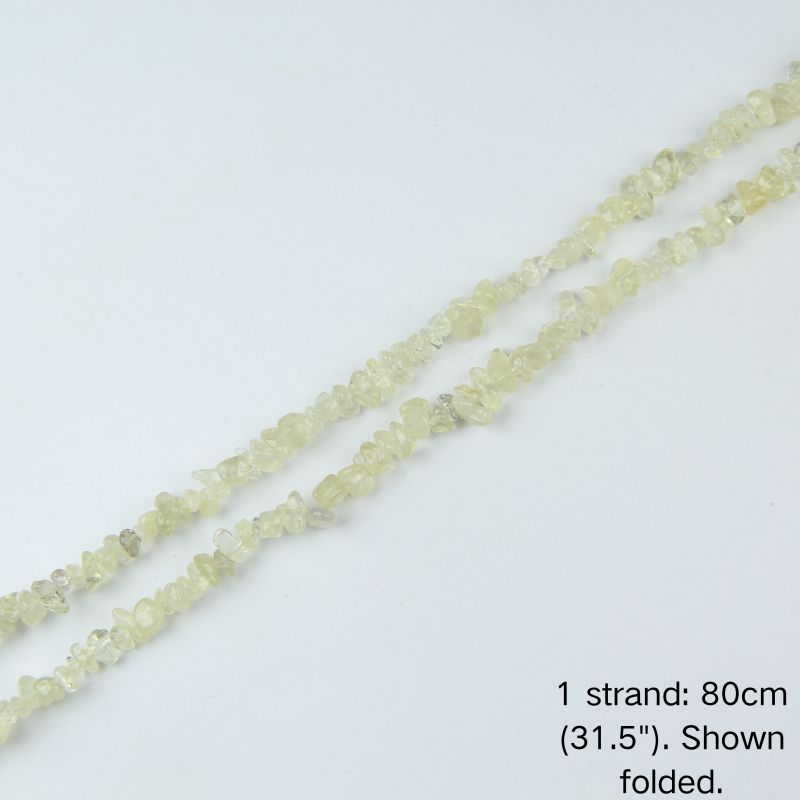 A single 80cm (31.5") strand of Citrine Yellow irregular crystal chip beads, shown folded to display actual length and nylon cord.