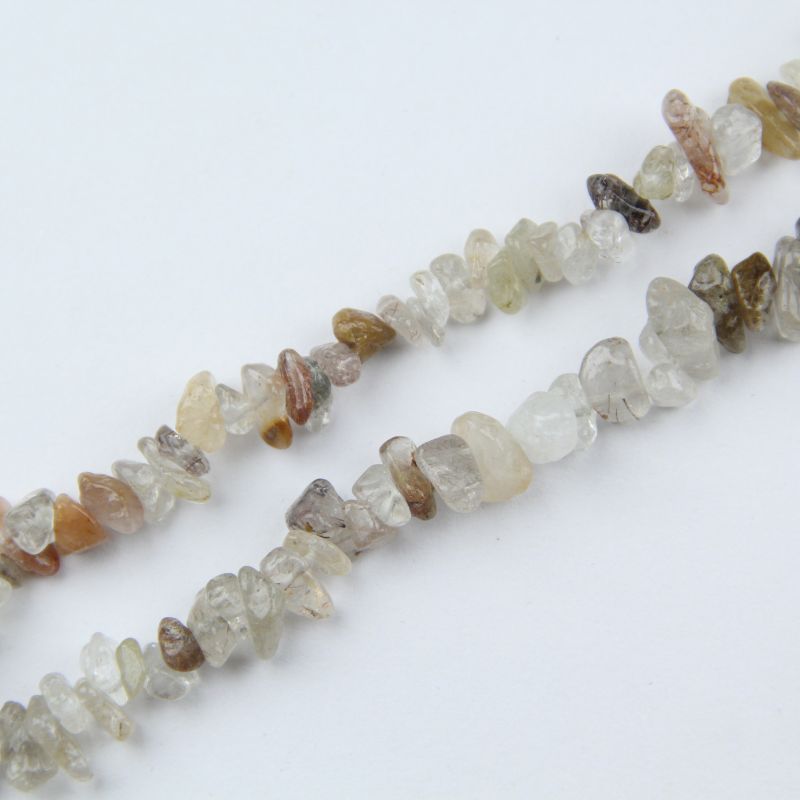 natural reddish copper rutilated quartz long necklace wearing on vintage bohemian outfit