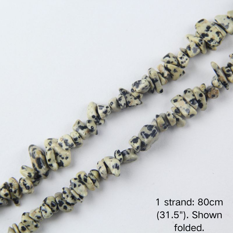 Close-up view of dalmatian stone chip cord, 80cm folded, showing 5-8mm natural speckled chips.