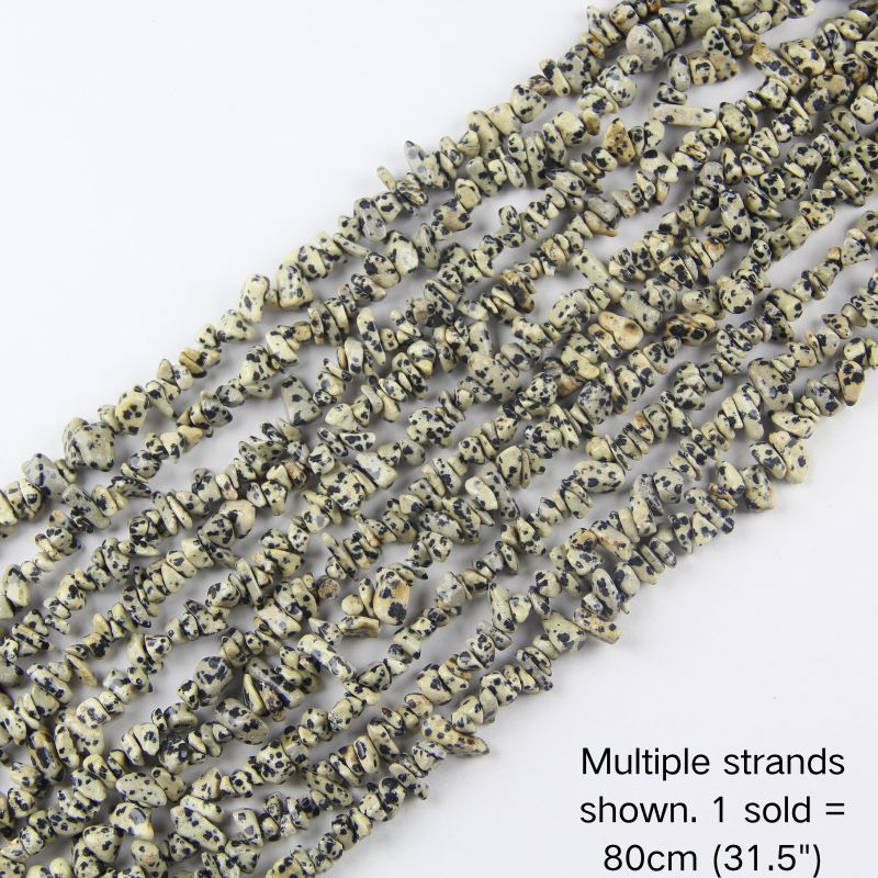 Multiple dalmatian stone chip strands shown together. 1 sold equals 1 strand 80cm (31.5").