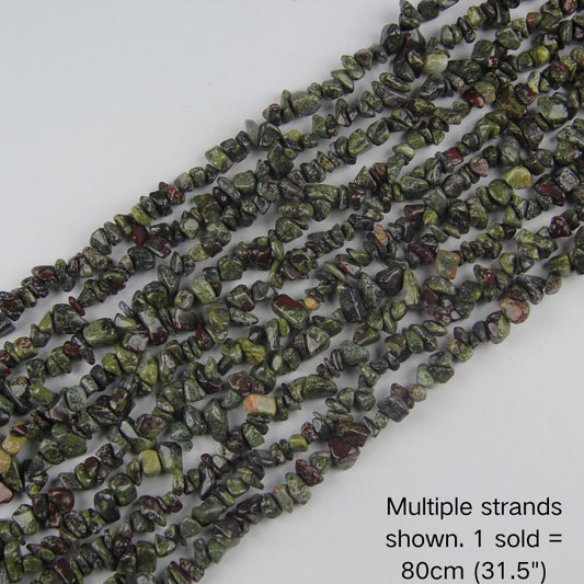 Multiple strands of natural dragon blood stone chips, deep forest green with crimson red spots, 31.5 inch beaded cord. 1 sold equals 1 strand.