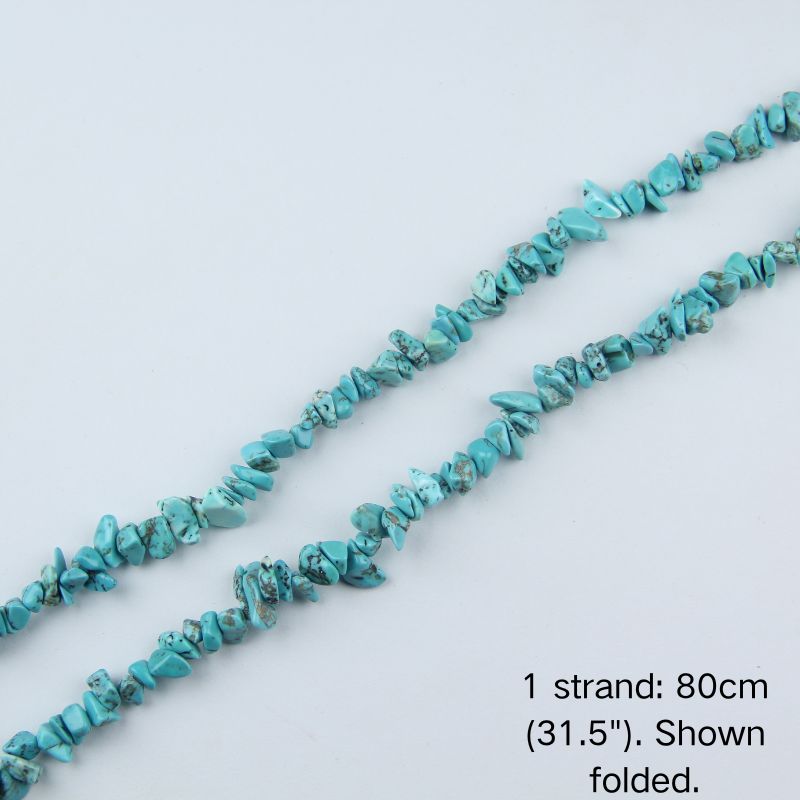 Single 80cm (31.5") dyed turquoise howlite chip bead strand in a folded arrangement for boho wrap bracelets.