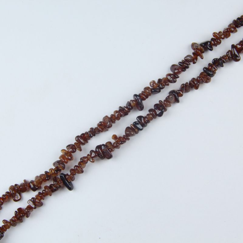 Flat lay of Fanta Garnet orange garnet beads, natural spessartine gemstones