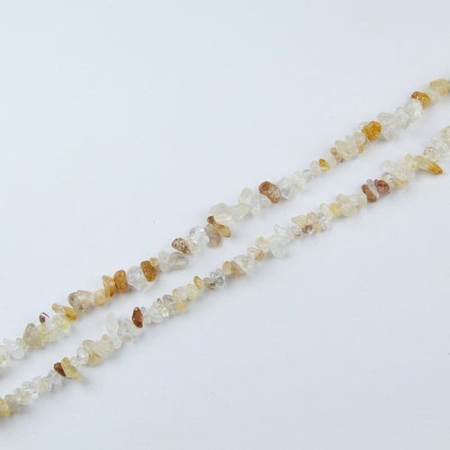 	yellow floral inclusion quartz irregular bead long necklace 31.5 inch flat lay on white background for yellow color variant