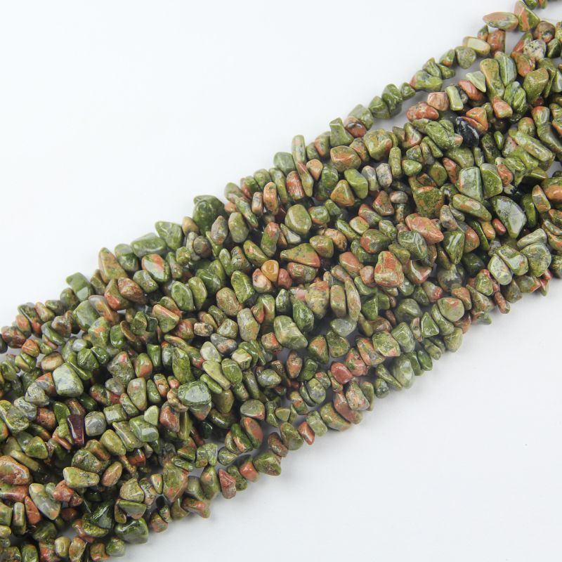 Stacked coils of natural spiderweb turquoise bead strand – 31.5 inches long, 5-8mm irregular rounds