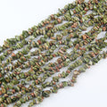 31.5 inch natural flower spiderweb turquoise bead strand with 5-8mm irregular round beads and dark matrix veining on nylon cord