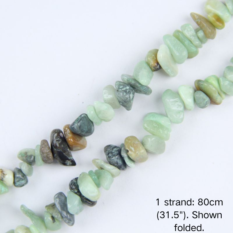 Close-up of a folded natural Amazonite chip bead strand, showing polished mint green, white, and earthy brown gravel in 5-8mm sizes.