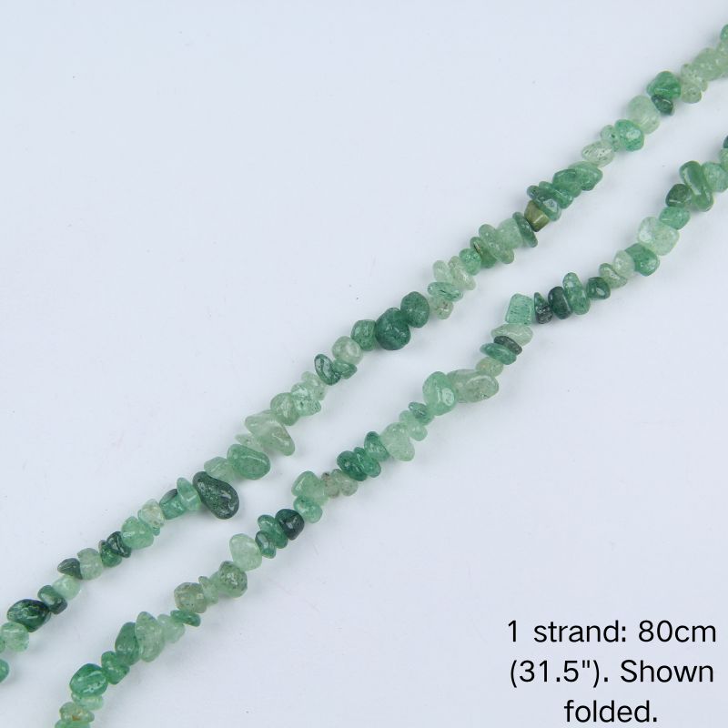 Green strawberry quartz chip beads strand folded on white background, 31.5 inches long, nylon cord.