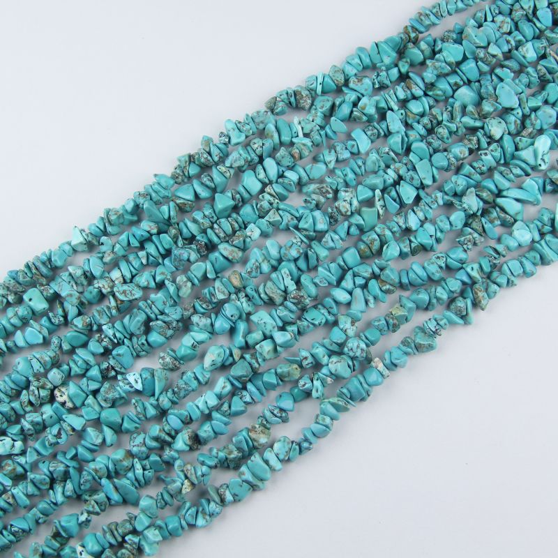 31.5 inch natural green turquoise bead strand with 5-8mm irregular round beads and dark matrix veining threaded on nylon cord