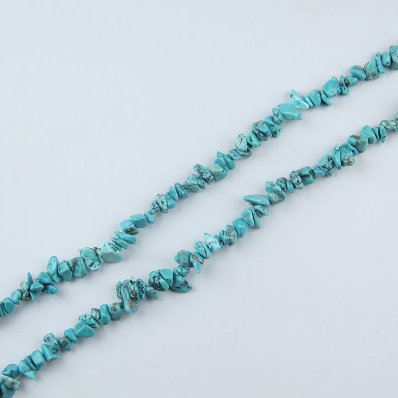 single flat lay of green turquoise necklace strand, 31.5 inches, 5-8mm irregular round beads strung on nylon cord