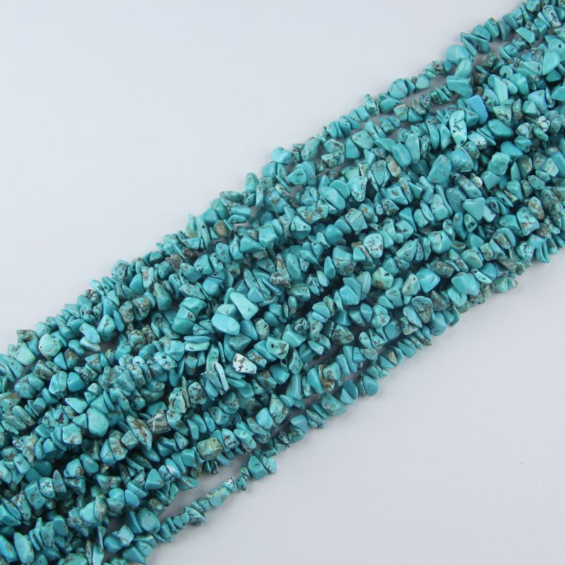 stacked coils of green turquoise bead strand, 31.5 inches long, irregular round 5-8mm beads with natural veining on nylon cord