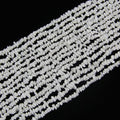 Multiple strands of irregular white porcelain beads arranged side by side, each strand 31.5 inches long with 5-8mm natural-shaped beads threaded on nylon cord.