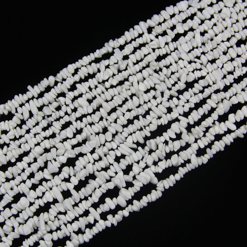 Multiple strands of irregular white porcelain beads arranged side by side, each strand 31.5 inches long with 5-8mm natural-shaped beads threaded on nylon cord.