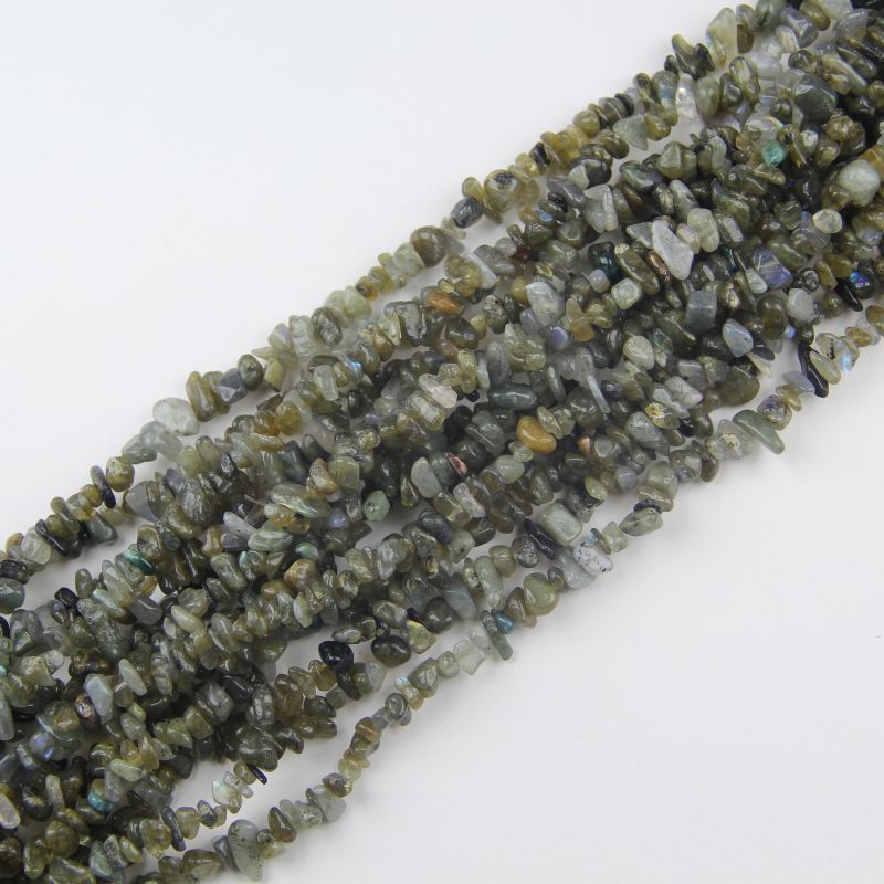 Labradorite bracelet stacked in multi-loop coils, iridescent gemstone beads flat lay