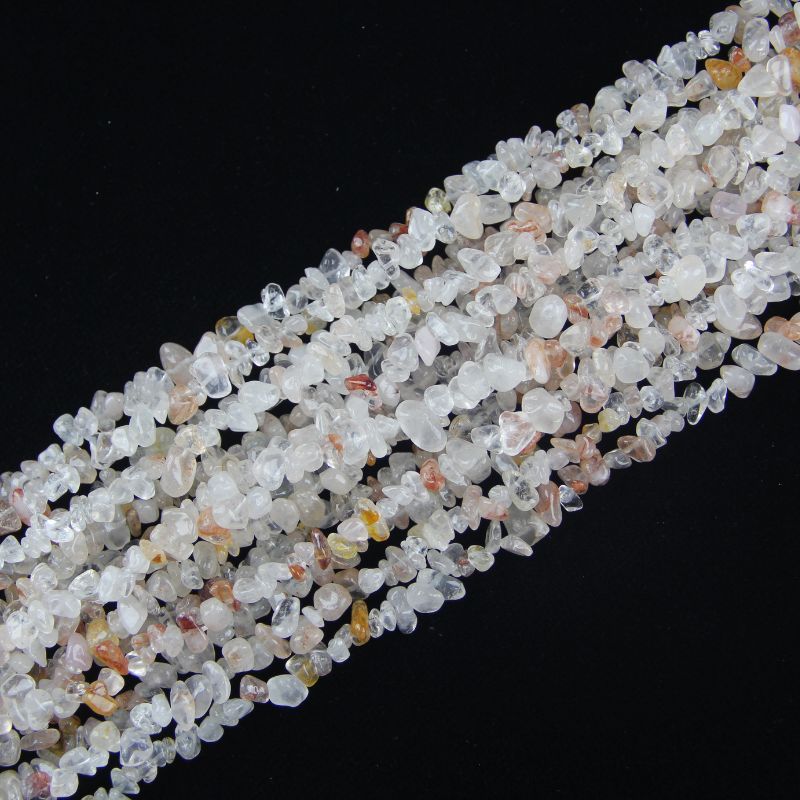 light pink floral inclusion quartz long bead chain hanging naturally against white background showing soft pink flower patterns