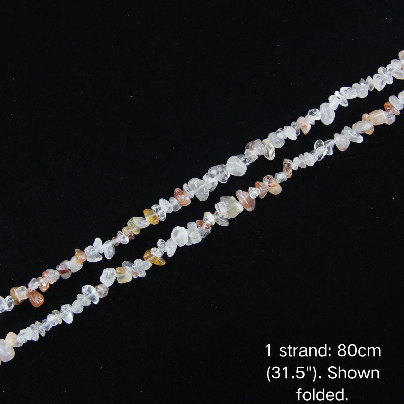 Light red hematoid quartz chip beads folded on white background, 80cm strand for jewelry making.