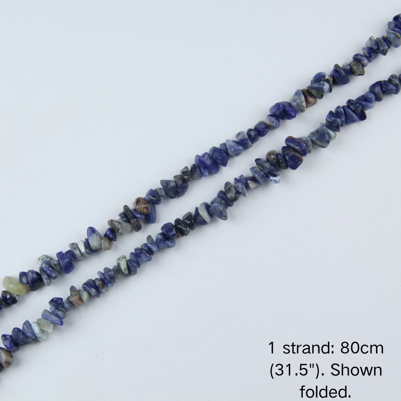 Mixed blue gemstone chip beaded strand, 31.5 inch (80cm) length shown folded. 1 sold equals 1 strand.