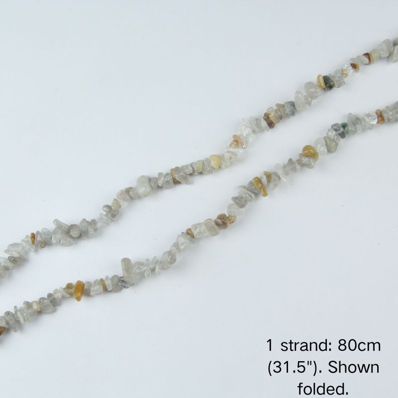 Mixed gemstone chip beaded strand, 31.5 inch (80cm) length shown folded on white background.