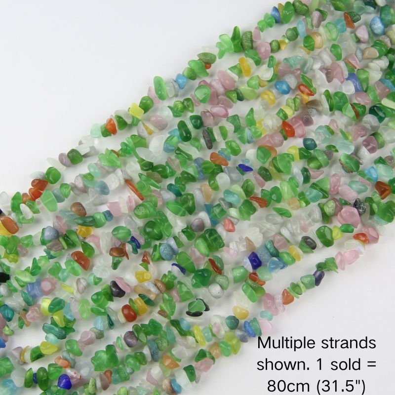 Multiple strands of 31.5" Artificial Multi-Color Cat's Eye chips (5-8mm) displayed as the cover image. Note: 1 strand sold per order.
