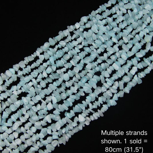 Multiple strands of natural blue chalcedony crushed stone chip beads, 80cm (31.5") per strand for jewelry making.