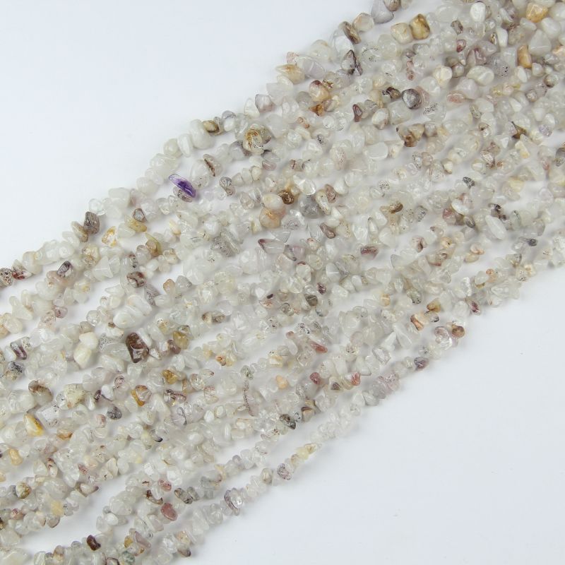 Natural cherry blossom agate irregular bead long necklace on white background, pink, lavender and cream beads with natural flower-like inclusions visible on each freeform round bead
