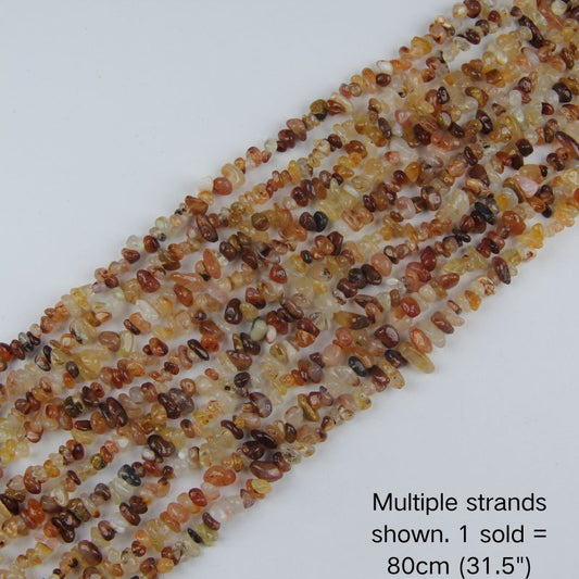 Multiple strands of natural Orange Agate chip beads shown, 80cm (31.5") 5-8mm strand pre-strung on nylon cord for DIY jewelry.