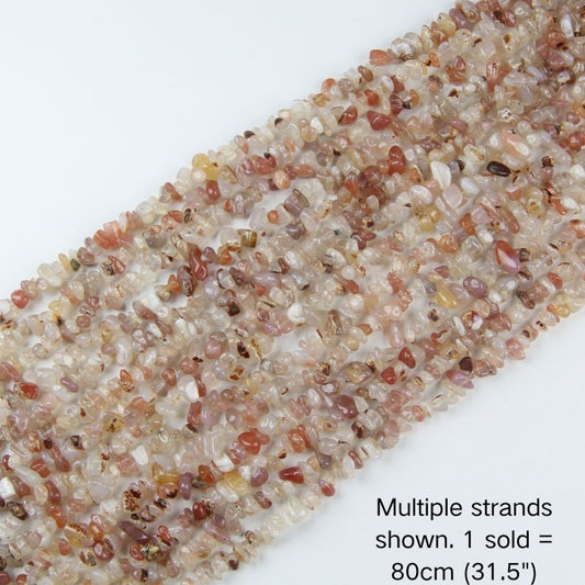 Multiple strands of natural Red and White Agate chip beads shown, 80cm (31.5") 5-8mm strand pre-strung on nylon cord for DIY jewelry.
