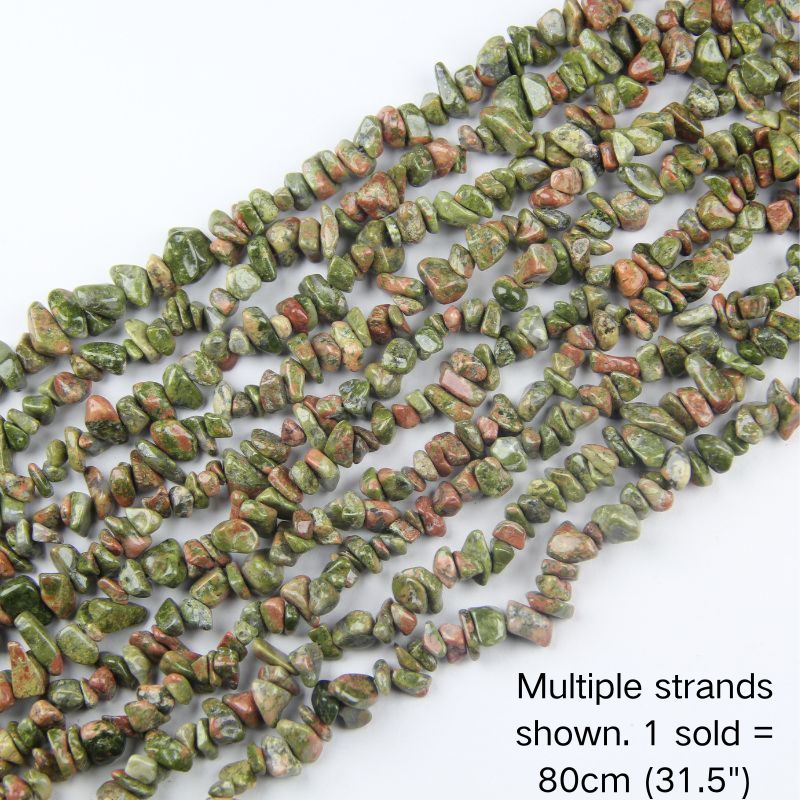 Multiple strands of natural spiderweb howlite chip beads shown, 80cm (31.5") 5-8mm strand pre-strung on nylon cord for DIY jewelry.