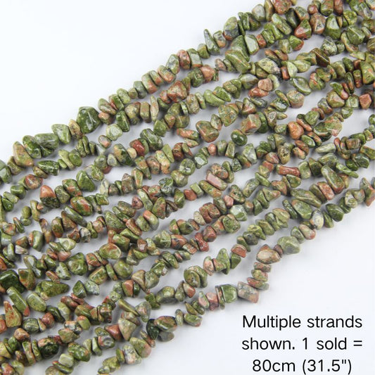 Multiple strands of natural spiderweb howlite chip beads shown, 80cm (31.5") 5-8mm strand pre-strung on nylon cord for DIY jewelry.