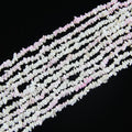 31.5 inch pink and white blossom howlite bead strand with 5-8mm irregular round beads and pink crackled veining threaded on nylon cord