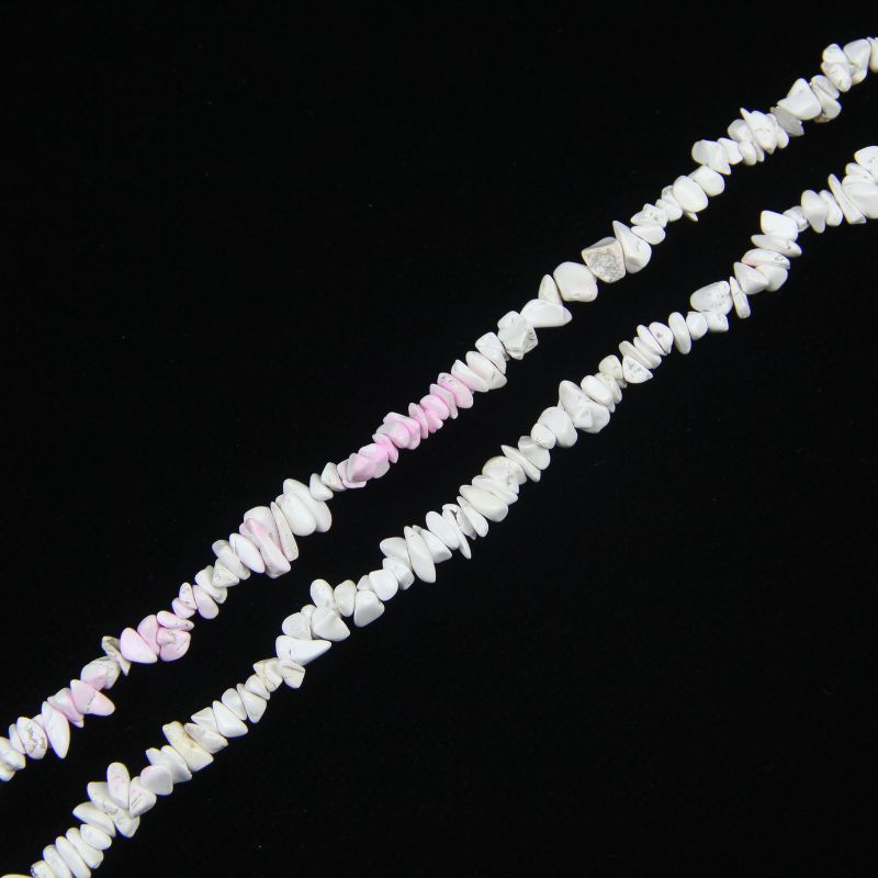 single flat lay of pink and white blossom howlite necklace strand, 31.5 inches, 5-8mm irregular round beads strung on nylon cord