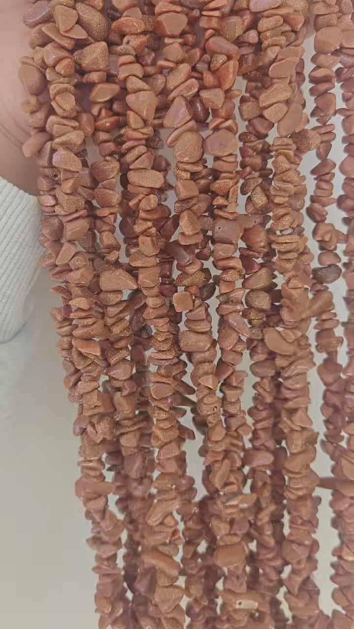 360 rotation of gold sandstone irregular chip bead long necklace, copper sparkles catching light from all angles like a starry night sky