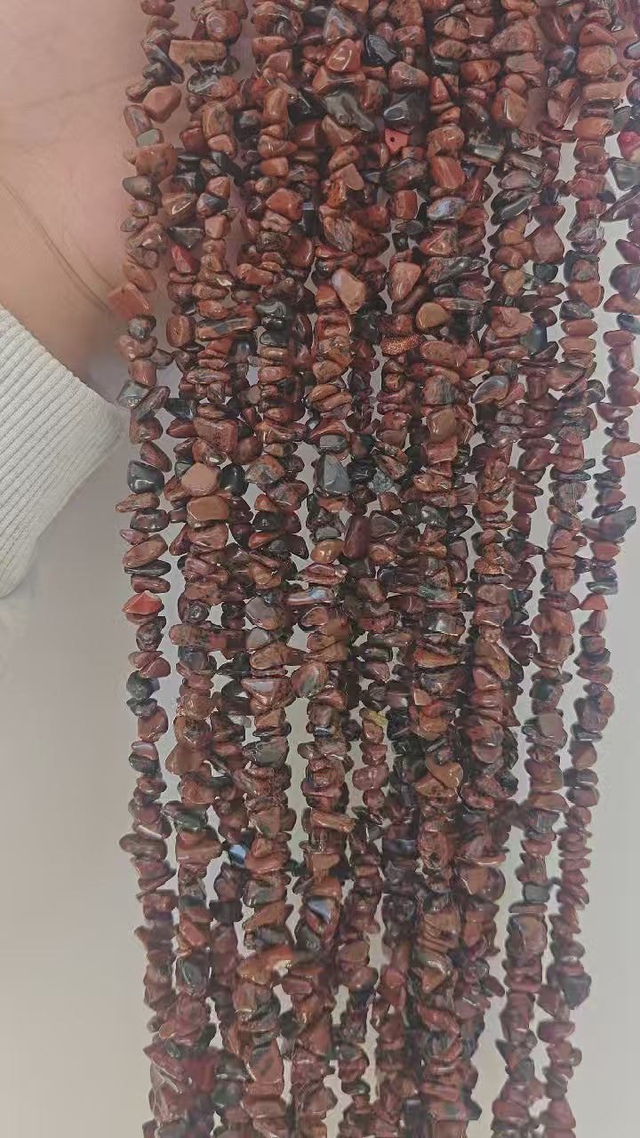 360-degree rotating view of golden swan obsidian irregular bead necklace showing rich gold sheen from all angles as light moves across beads