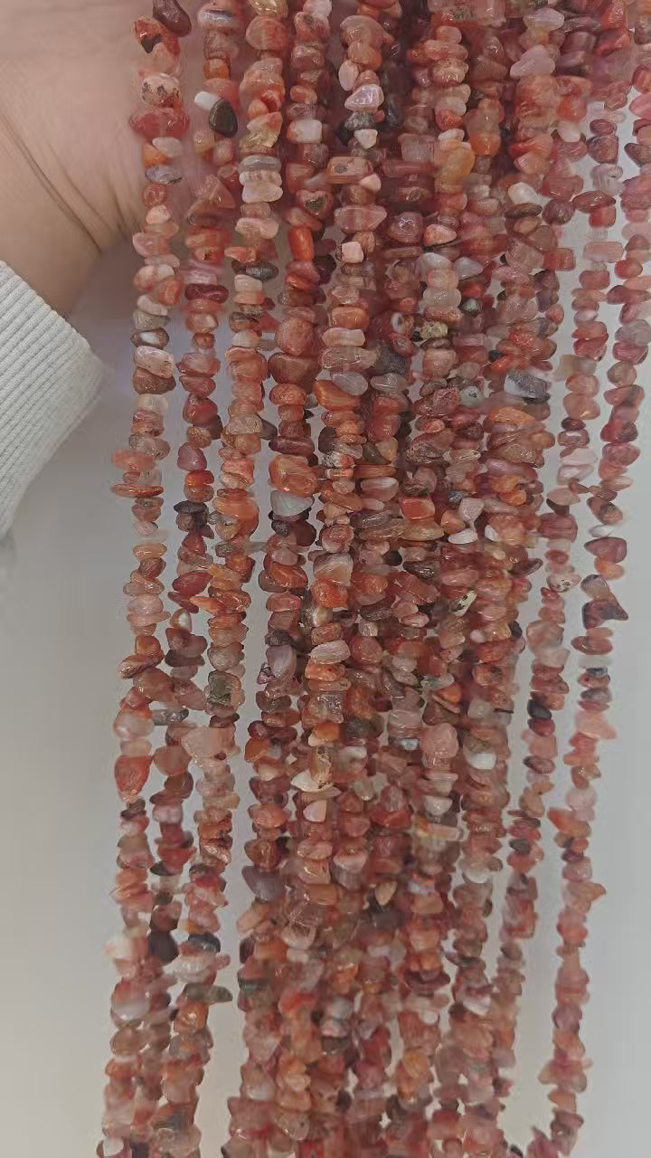 360 rotation of natural red agate irregular bead long necklace, deep red colors visible from all angles