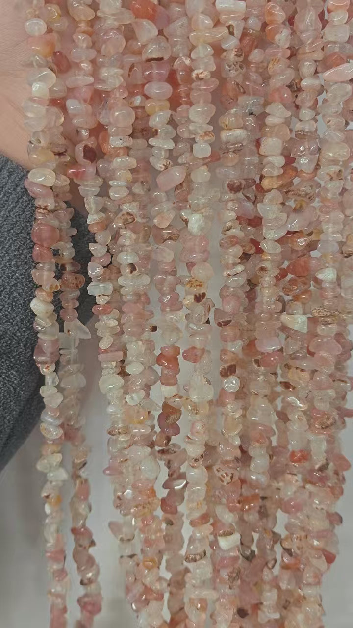 360 rotation of red and white agate irregular bead long necklace, natural banding visible from all angles