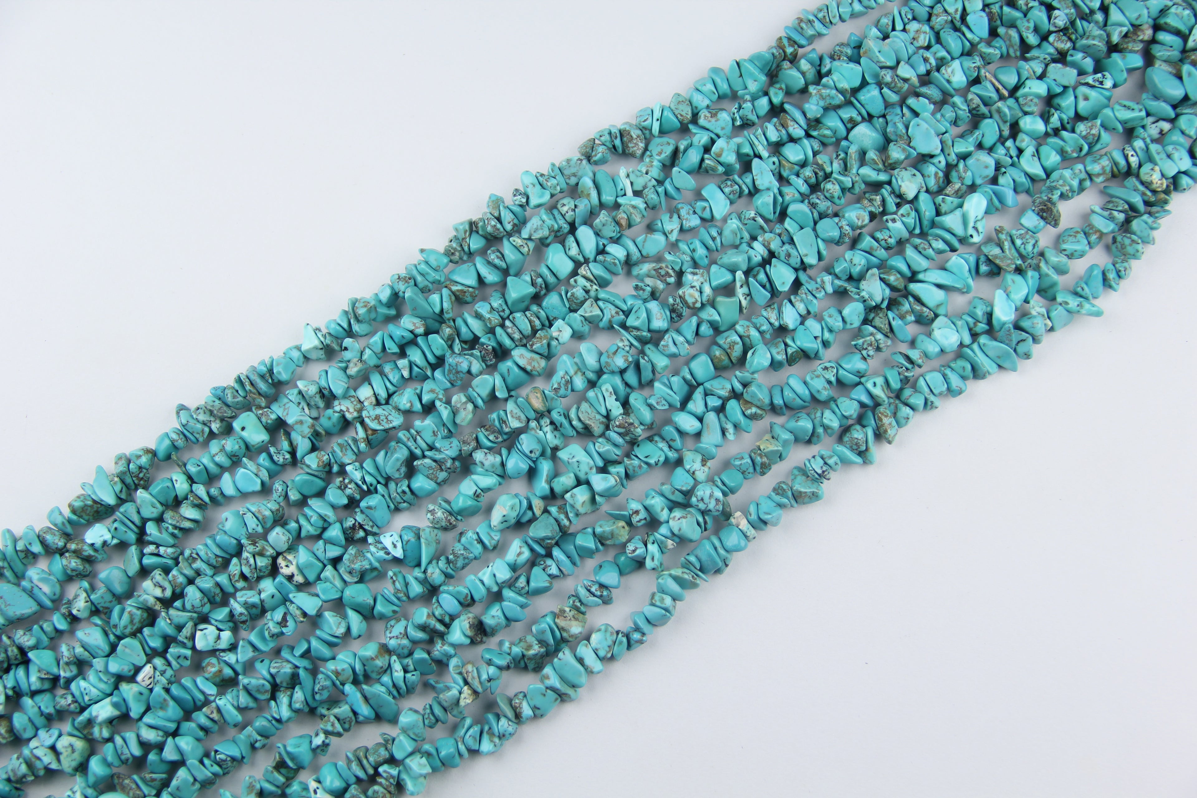 Green turquoise bead strand video thumbnail – 31.5 inch irregular round beads with earthy green color and matrix veining on nylon cord