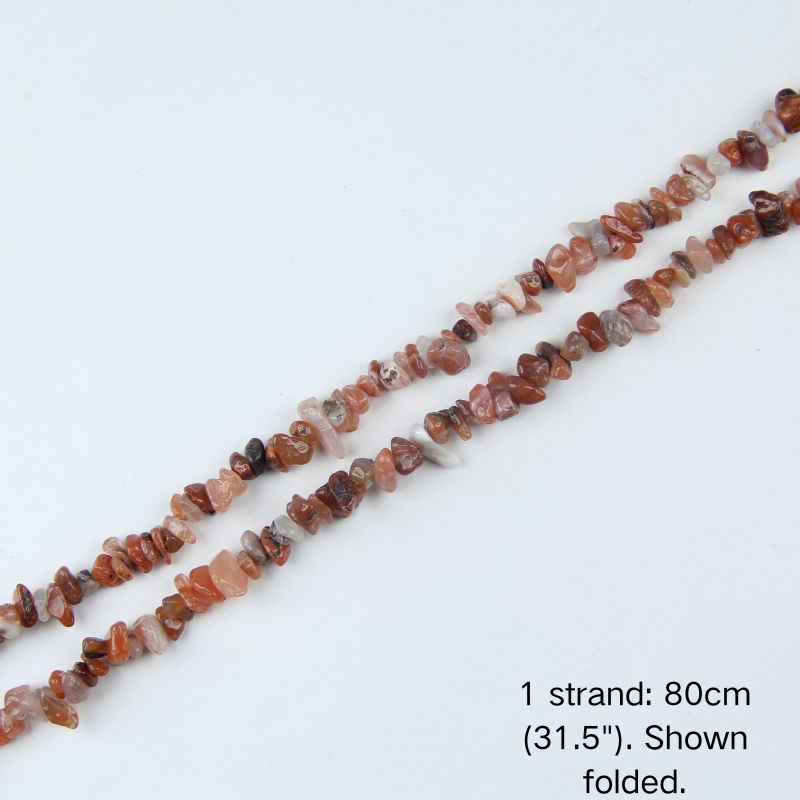 A single 80cm (31.5") strand of Red Agate irregular chip beads, folded to display actual length and strong nylon cord. Perfect for jewelry making.