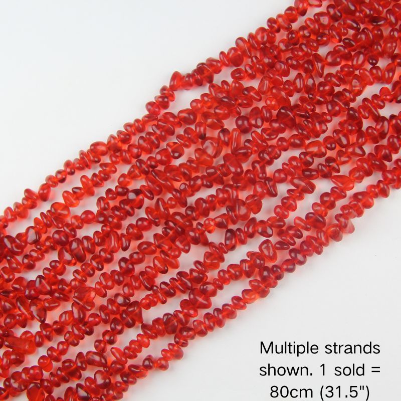 Multiple strands of 31.5" red irregular glass chip beads (5-8mm) displayed on a white background. Note: 1 strand sold per order, measuring 80cm (31.5").