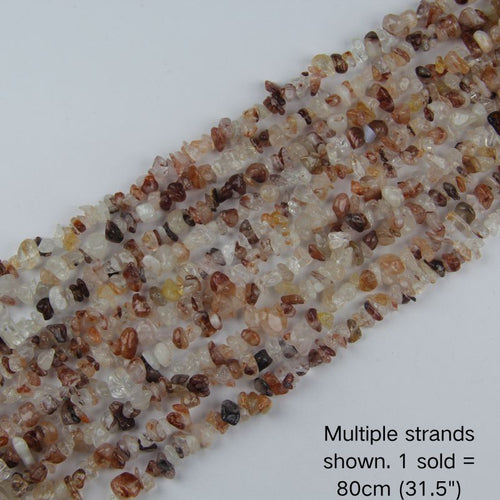 Multiple strands of 31.5" Red Hematoid Quartz chip beads (5-8mm) arranged in a row, showing deep red iron oxide inclusions and consistent quality for DIY beadwork.