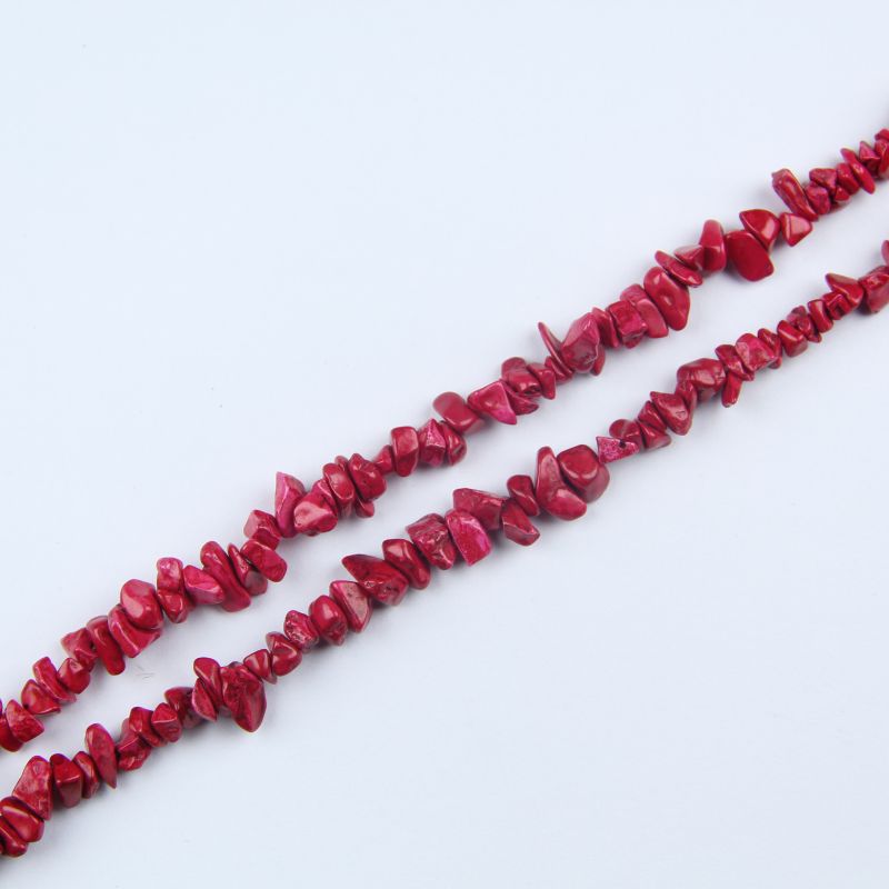 single flat lay of red turquoise necklace strand, 31.5 inches, 5-8mm irregular round beads strung on nylon cord